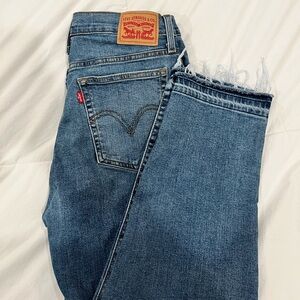 Levi’s Medium Wash Wedgie Straight with Distressed Hem